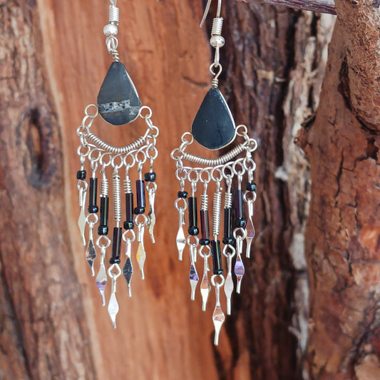 These beautiful earrings incorporate Black Tourmaline Stone with Silver plated hooks. They have been hand made in Peru and are presented in a traditionally made pouch, gift wrapped and ready to give