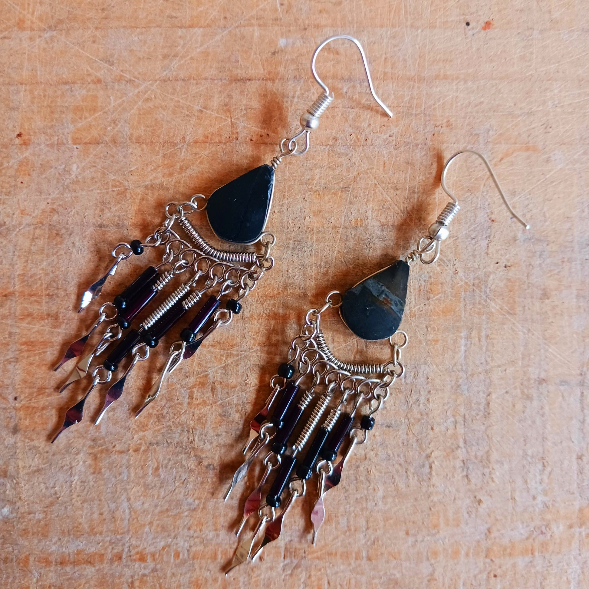 These beautiful earrings incorporate Black Tourmaline Stone with Silver plated hooks. They have been hand made in Peru and are presented in a traditionally made pouch, gift wrapped and ready to give