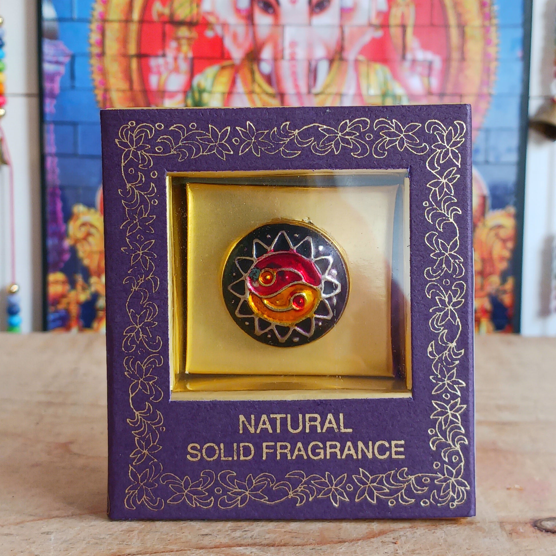 Natural solid Song of India Patchouli fragrance cream presented in a beautiful small brass cloisonné tin, makes an ideal gift for family and friends.