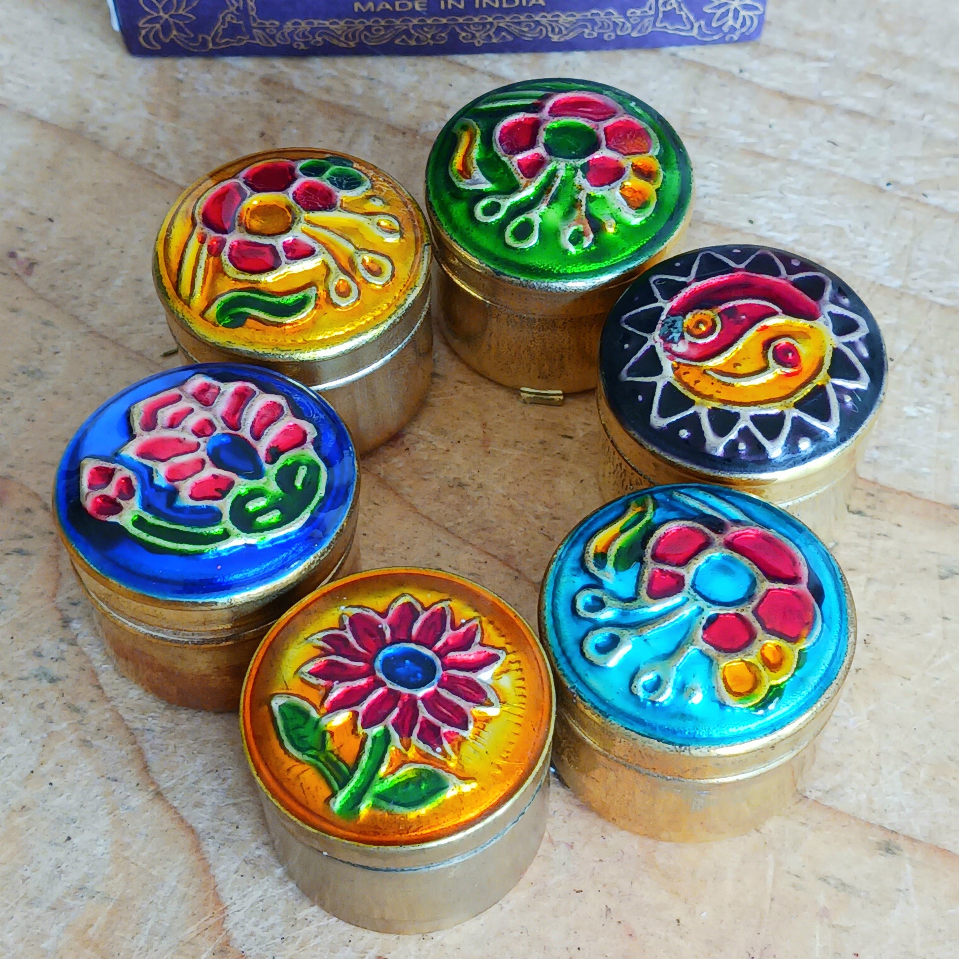 Natural solid Song of India Patchouli fragrance cream presented in a beautiful small brass cloisonné tin, makes an ideal gift for family and friends.