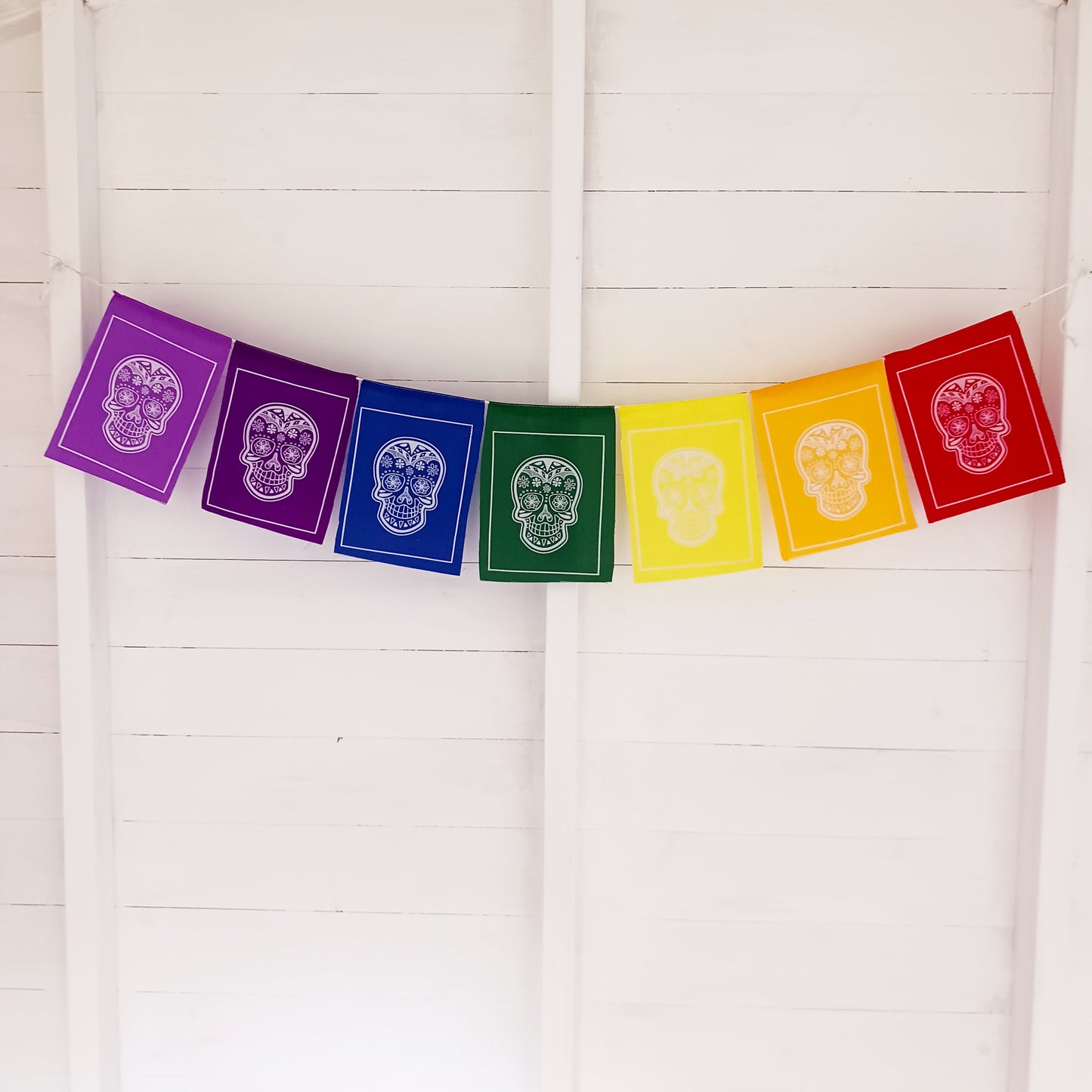 These bright Sugar Skull prayer flags will bring a small piece of colorful Mexican culture to your home.