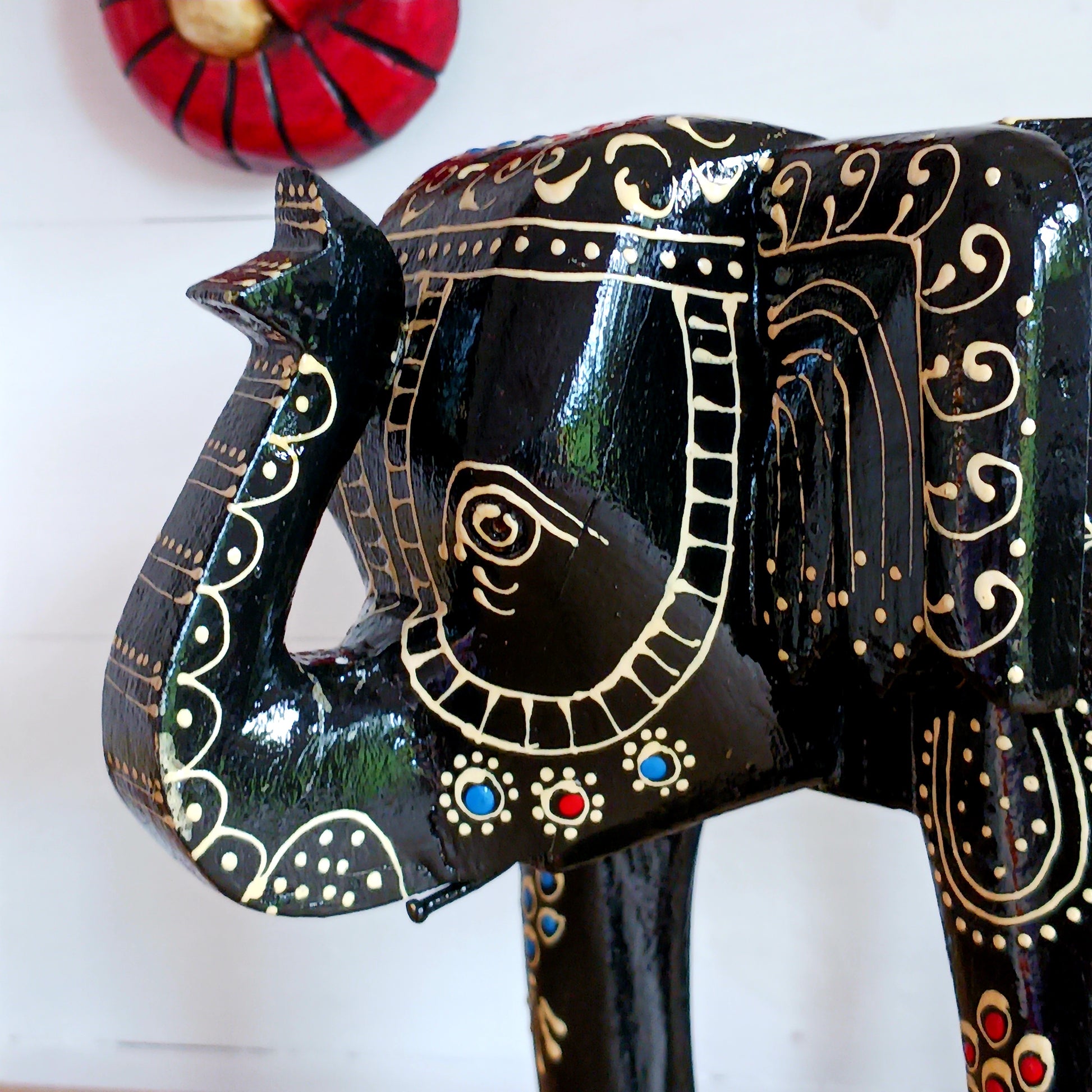 These beautifully hand painted footstools are shaped as elephants and decorated with traditional Indian designs.