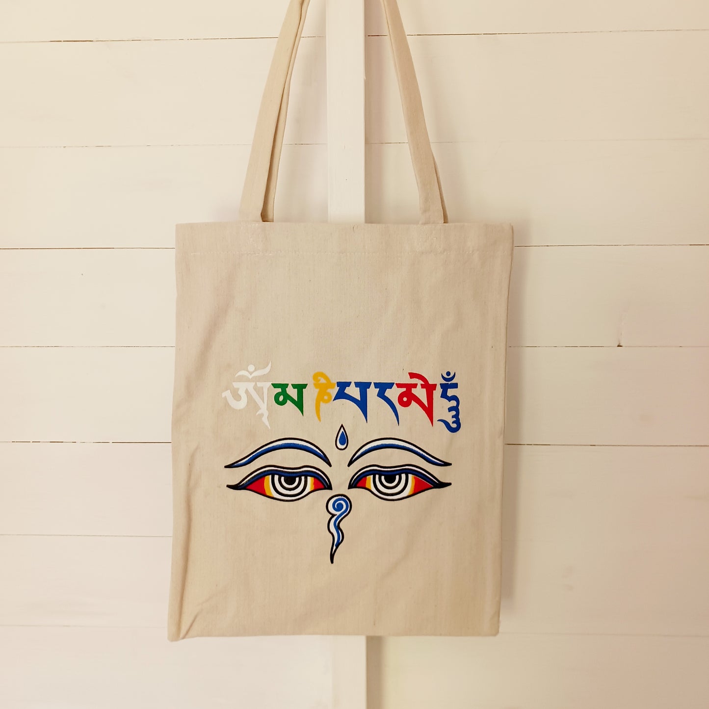 Tote shopper bag that is both eco-friendly and convenient. The bag is made of 100% cotton, which makes it a great alternative to plastic bags that harm the environment.