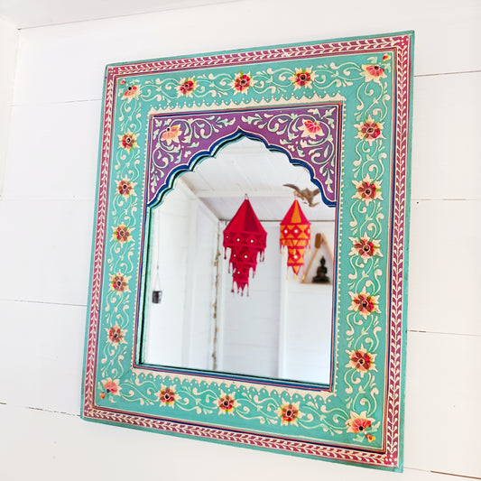 These beautiful Indian mirrors are made from sustainable mango wood and hand painted in a turquoise floral design.