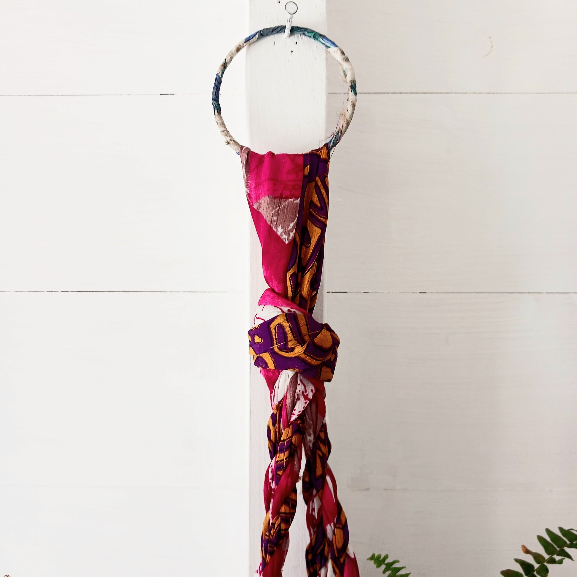 This beautiful handmade sari plant hanger will add a splash of colour and boho chic to your home. Made from scraps of used sari, its simple design ensures that no fabric is wasted but is re-purposed into an elegant product. 