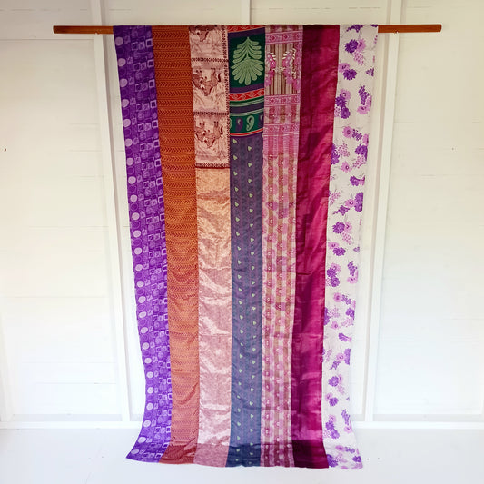 These beautiful curtains are handmade from assorted panels of Indian sari fabric, hand crafted into beautiful recycled curtain panels. The combined varieties of silky soft material are made with an easy to mount top hanging rod pocket.