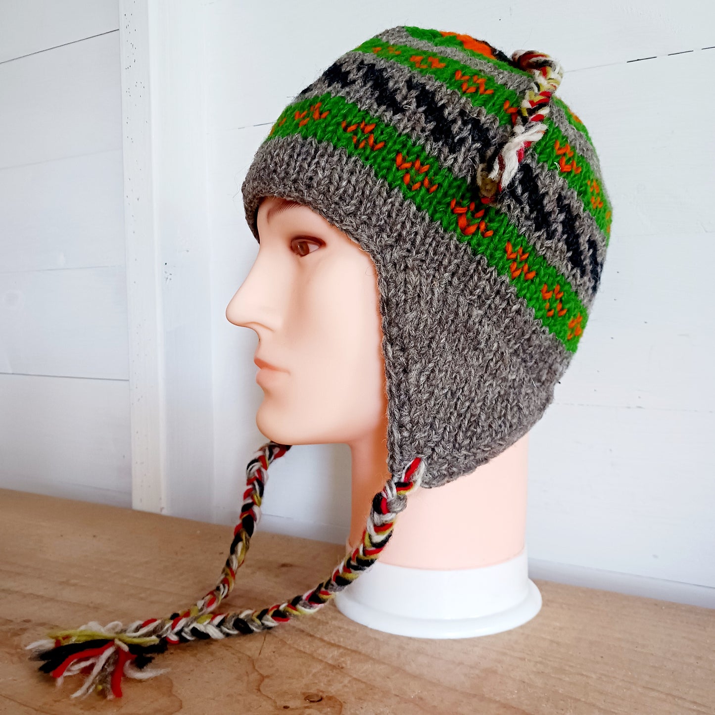 Chunky wool earflap hats hand made in Nepal with fleece lining for extra warmth and comfort, this handmade hat is awesomely warm.