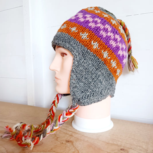 Chunky wool earflap hats hand made in Nepal with fleece lining for extra warmth and comfort, this handmade hat is awesomely warm.