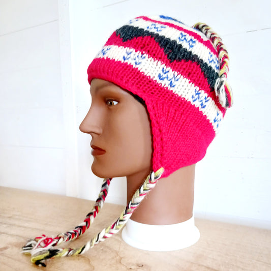 Chunky wool earflap hats hand made in Nepal with fleece lining for extra warmth and comfort, this handmade hat is awesomely warm.