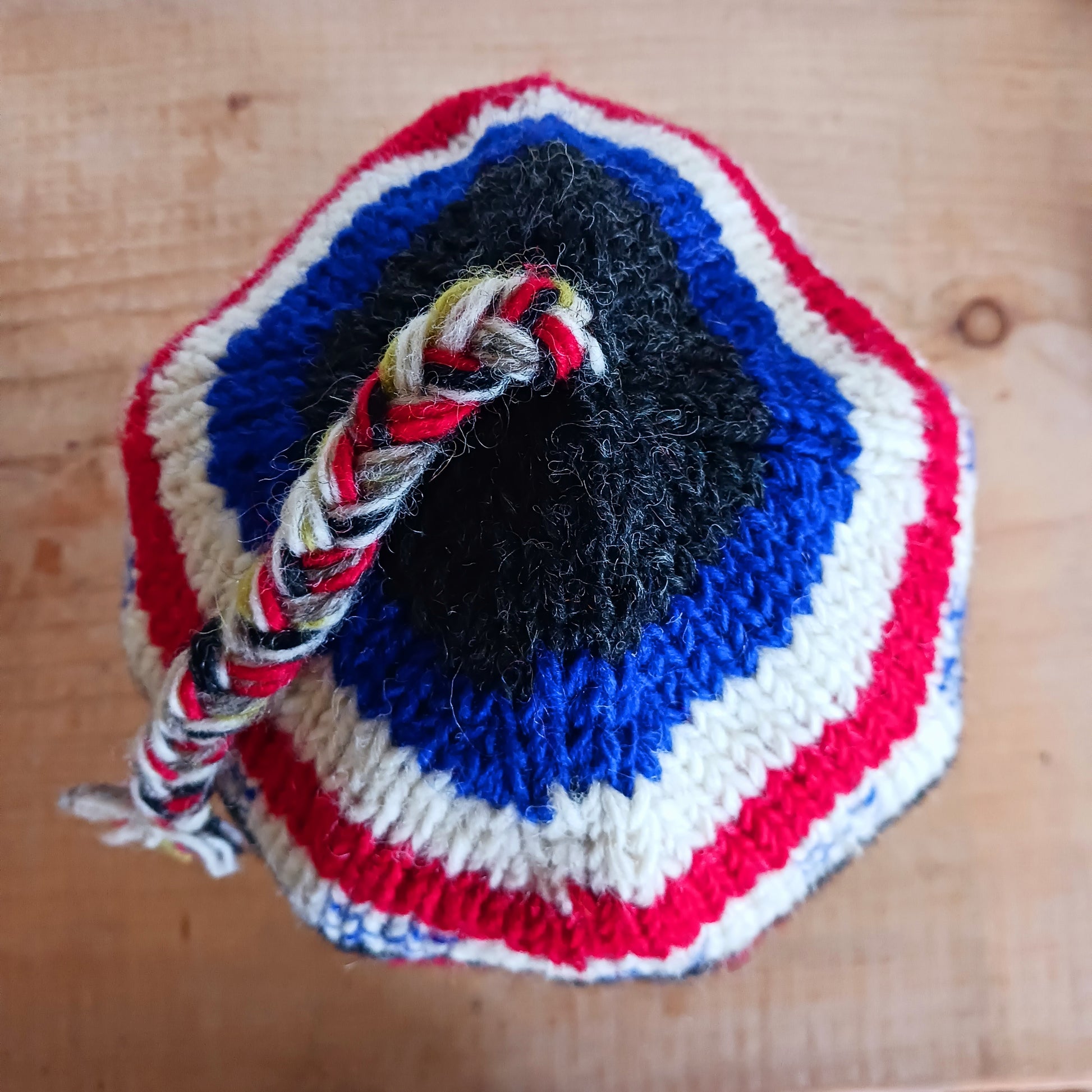 Chunky wool earflap hats hand made in Nepal with fleece lining for extra warmth and comfort, this handmade hat is awesomely warm.