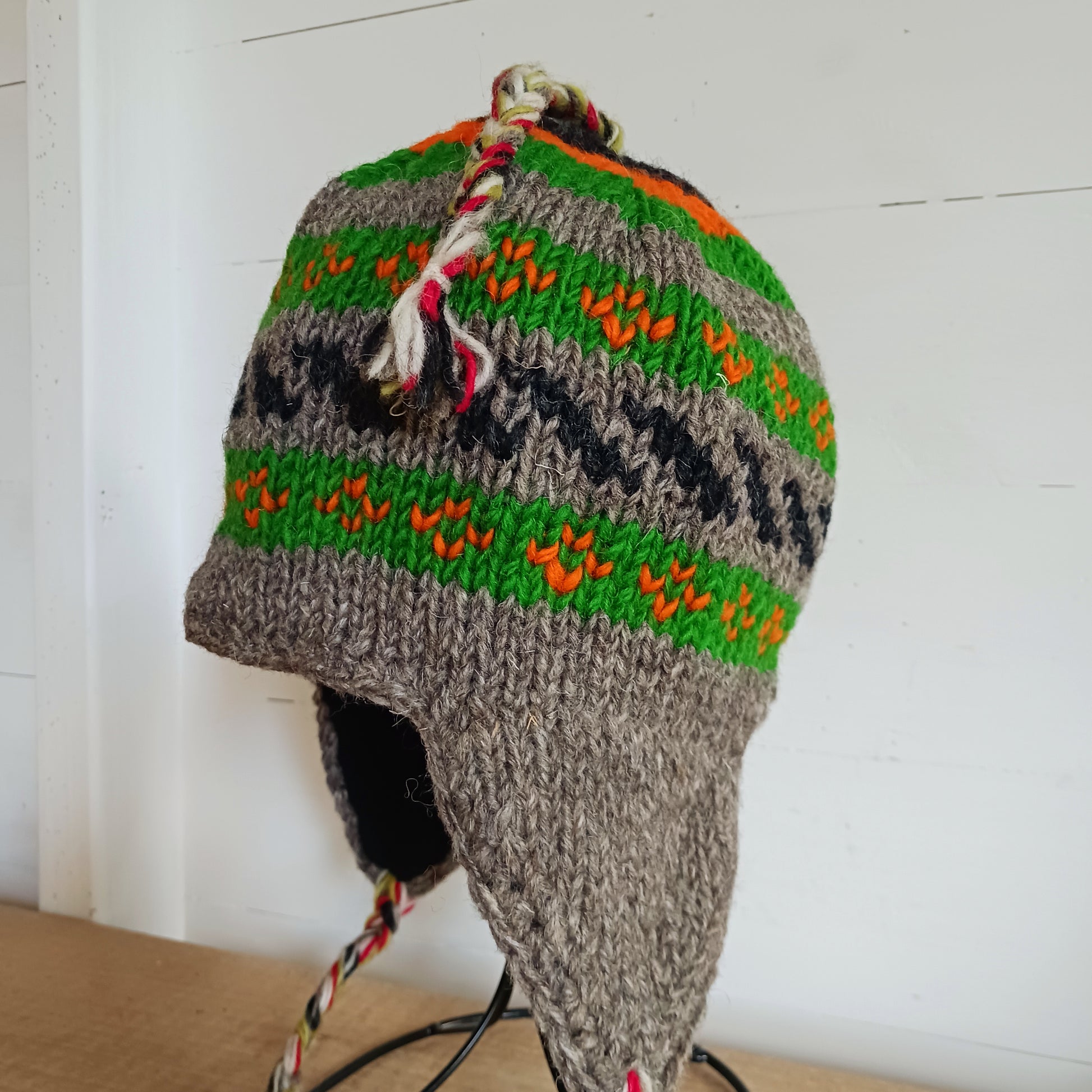 Chunky wool earflap hats hand made in Nepal with fleece lining for extra warmth and comfort, this handmade hat is awesomely warm.