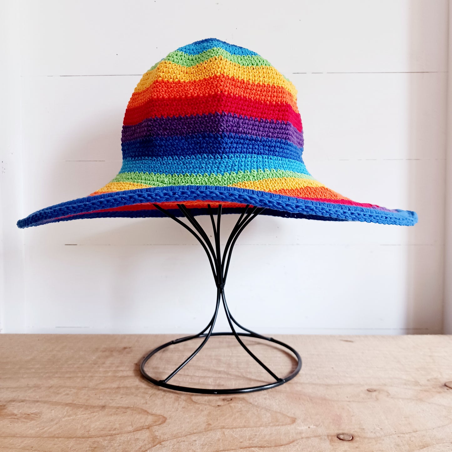 This lovely Rainbow crochet sun hat is handmade and Fairtrade from Indonesia. Each hat has a malleable wire woven into the rim to help keep the shape. The hat is wide brimmed and provides protection from the sun, so perfect for any summer outdoor activity.