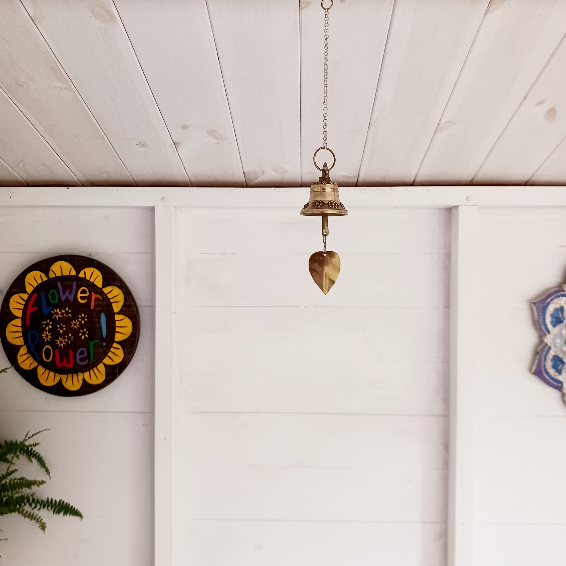 This hanging bell is made of brass in traditional Temple bell design. The sound is beautifully clear, light and airy. It is perfect to hang in your garden outdoors or hanging indoors as a decorative item.