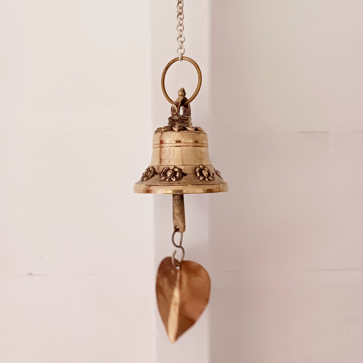 This hanging bell is made of brass in traditional Temple bell design. The sound is beautifully clear, light and airy. It is perfect to hang in your garden outdoors or hanging indoors as a decorative item.