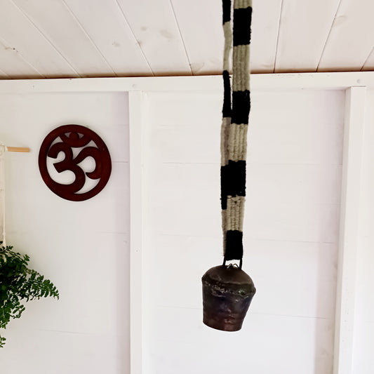 These traditionally designed yak bells come with a strong woolen neck strap for hanging. Traditionally these bells are hung around the necks of yaks in Nepal and Tibet so the animals can be located. Nowadays people use them as wind chimes as well. The bell produces a wonderfully unique crisp and clear sound.