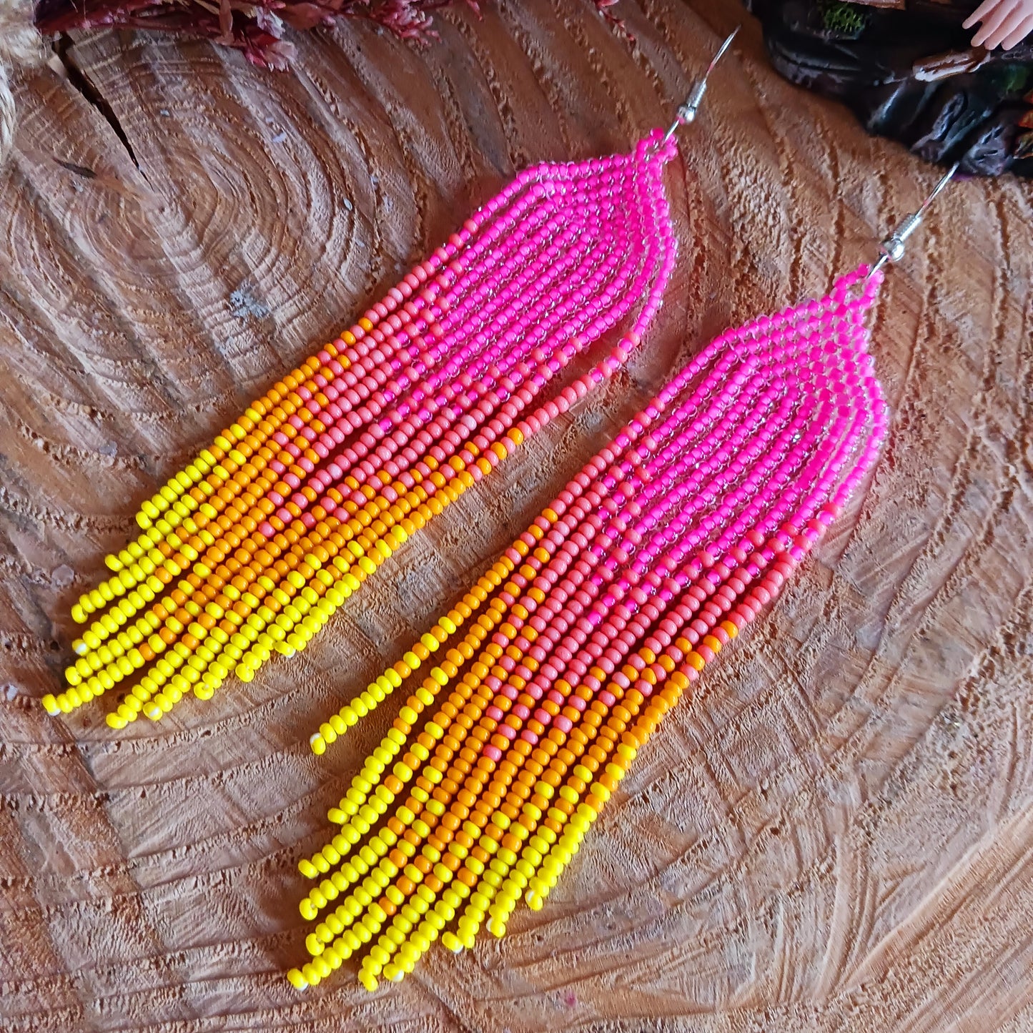 These bold and beautiful earrings are handsewn in Guatemala. Beadwork is a relatively new handicraft in Guatemala, around fifteen years or so, but it has been picked up all across the country and you will see it being sold at almost every market.