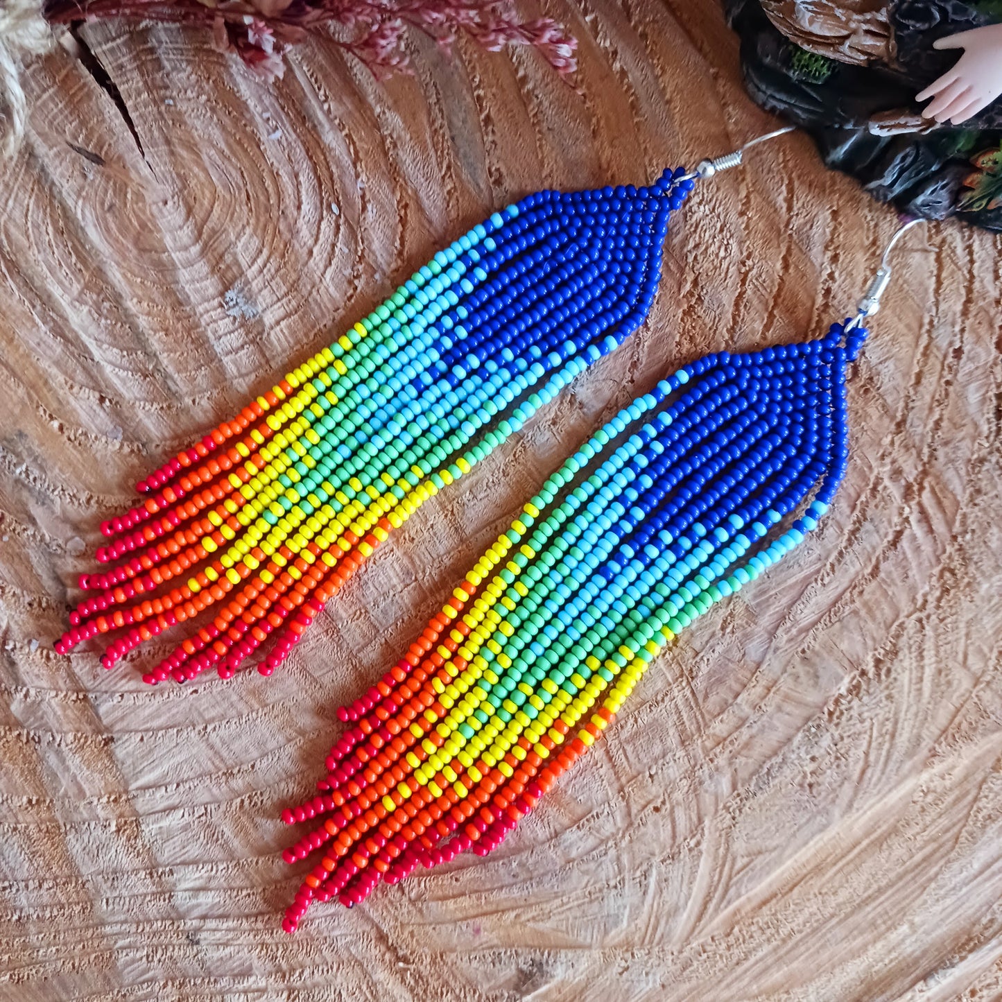 These bold and beautiful earrings are handsewn in Guatemala. Beadwork is a relatively new handicraft in Guatemala, around fifteen years or so, but it has been picked up all across the country and you will see it being sold at almost every market.