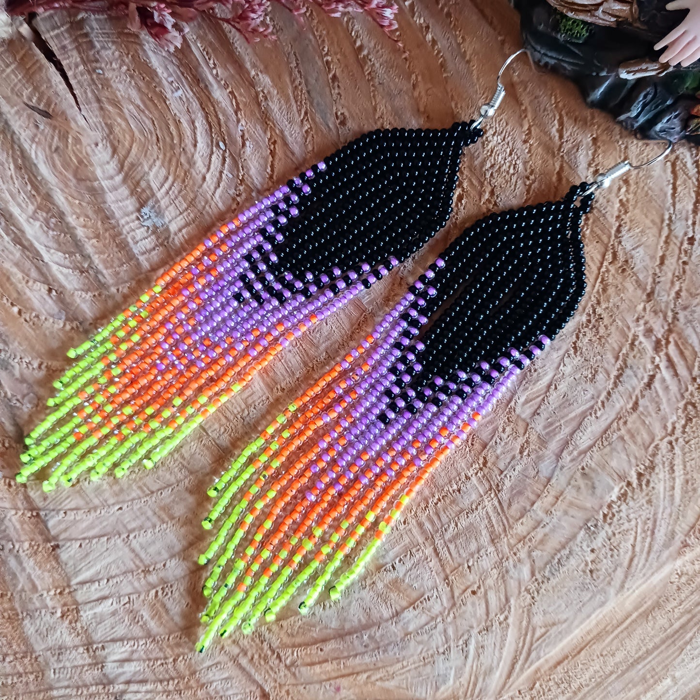 These bold and beautiful earrings are handsewn in Guatemala. Beadwork is a relatively new handicraft in Guatemala, around fifteen years or so, but it has been picked up all across the country and you will see it being sold at almost every market.