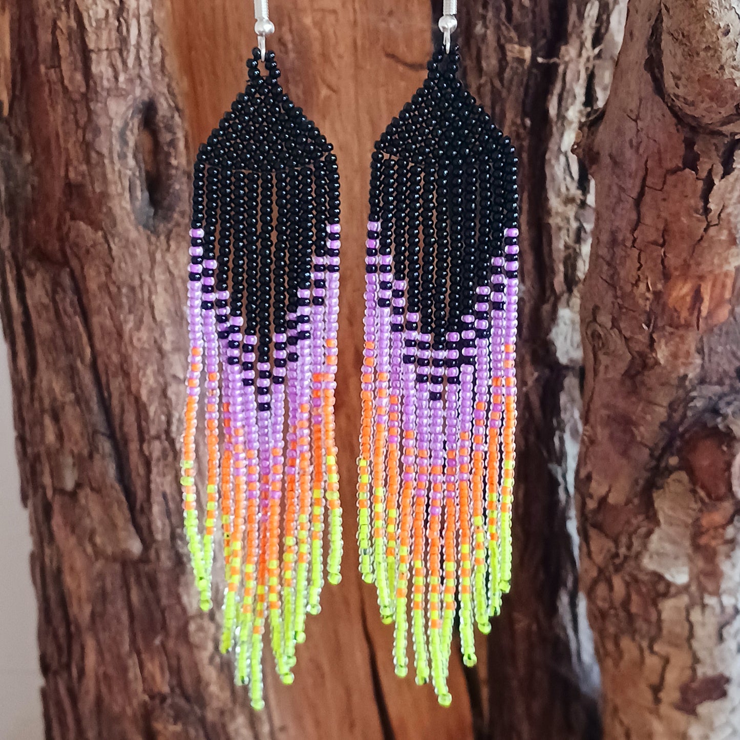 These bold and beautiful earrings are handsewn in Guatemala. Beadwork is a relatively new handicraft in Guatemala, around fifteen years or so, but it has been picked up all across the country and you will see it being sold at almost every market.