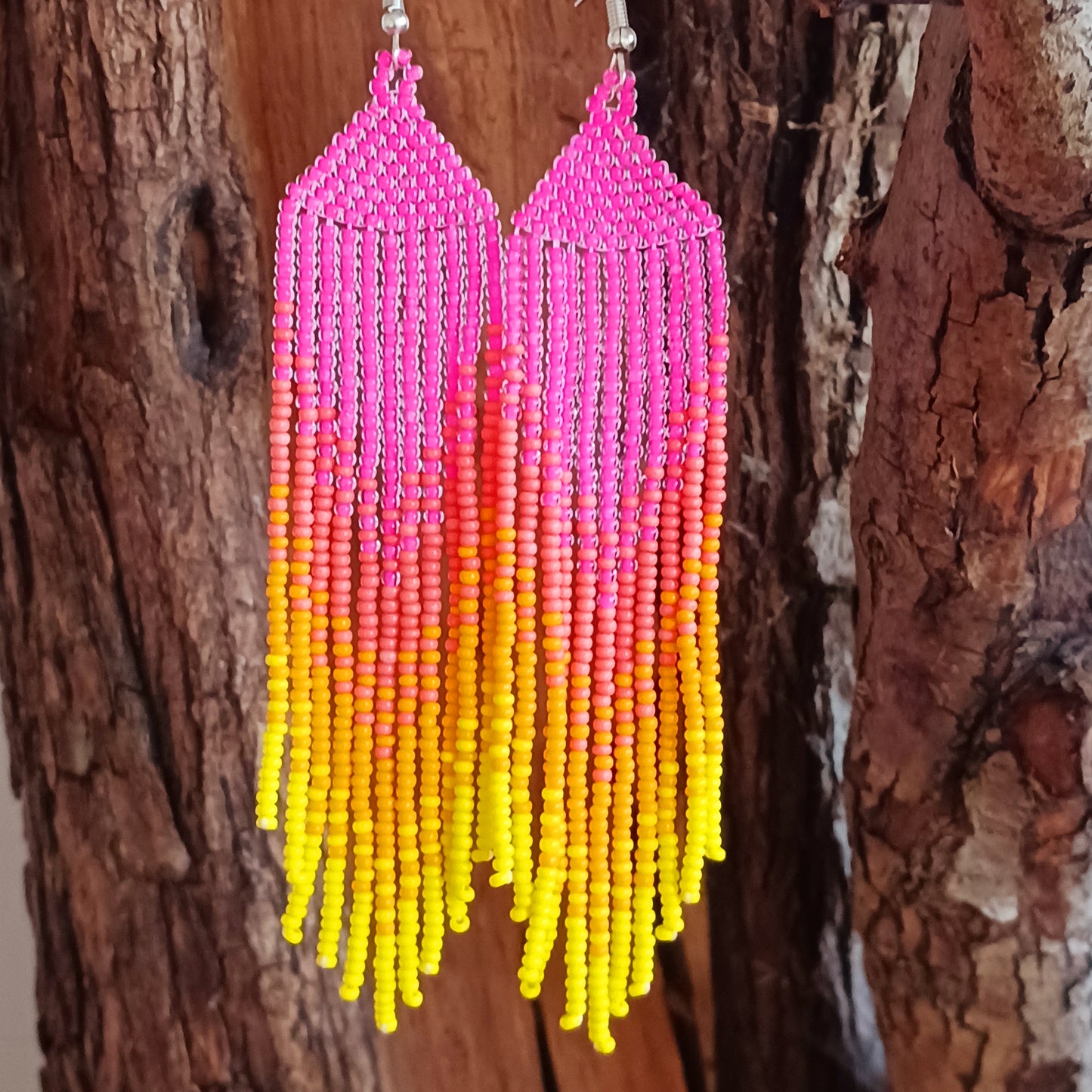 These bold and beautiful earrings are handsewn in Guatemala. Beadwork is a relatively new handicraft in Guatemala, around fifteen years or so, but it has been picked up all across the country and you will see it being sold at almost every market.