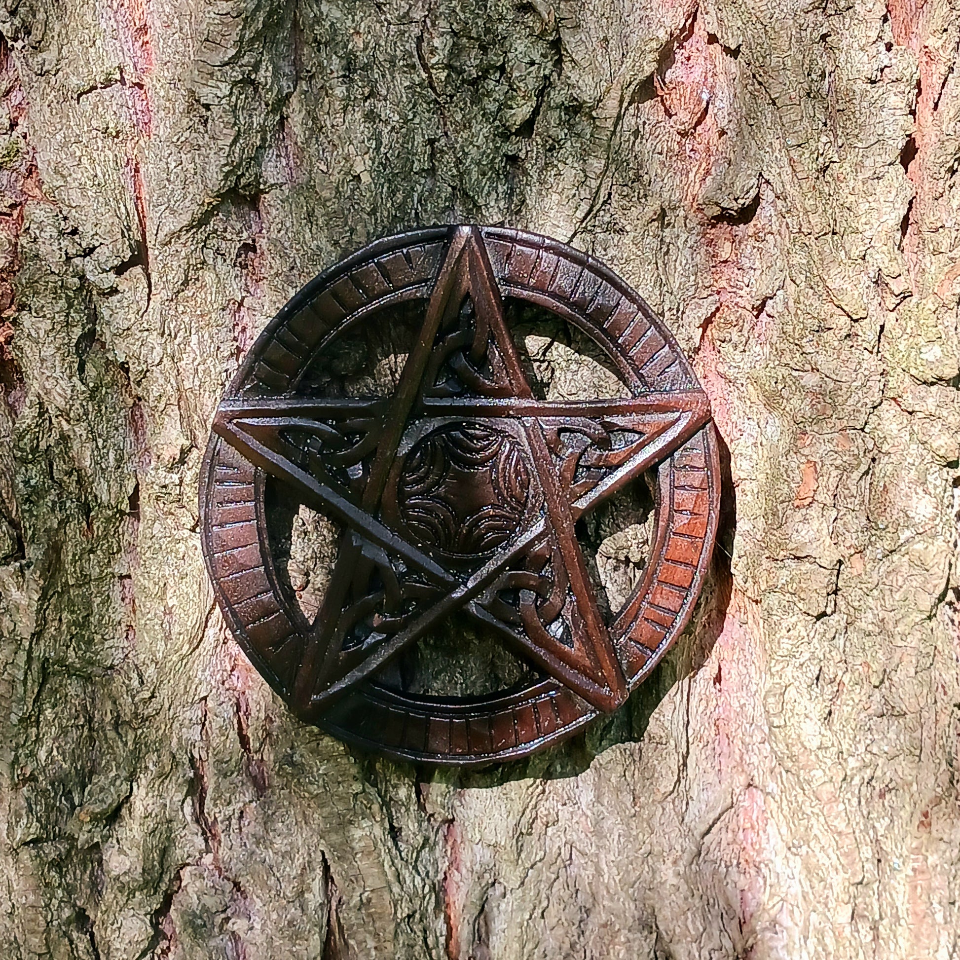 A pentacle is a pentagram surrounded by a circle used to invoke a spirit or energy. The outer circle of the pentagram is sometimes interpreted as binding the elements together or bringing them into harmony with each other.