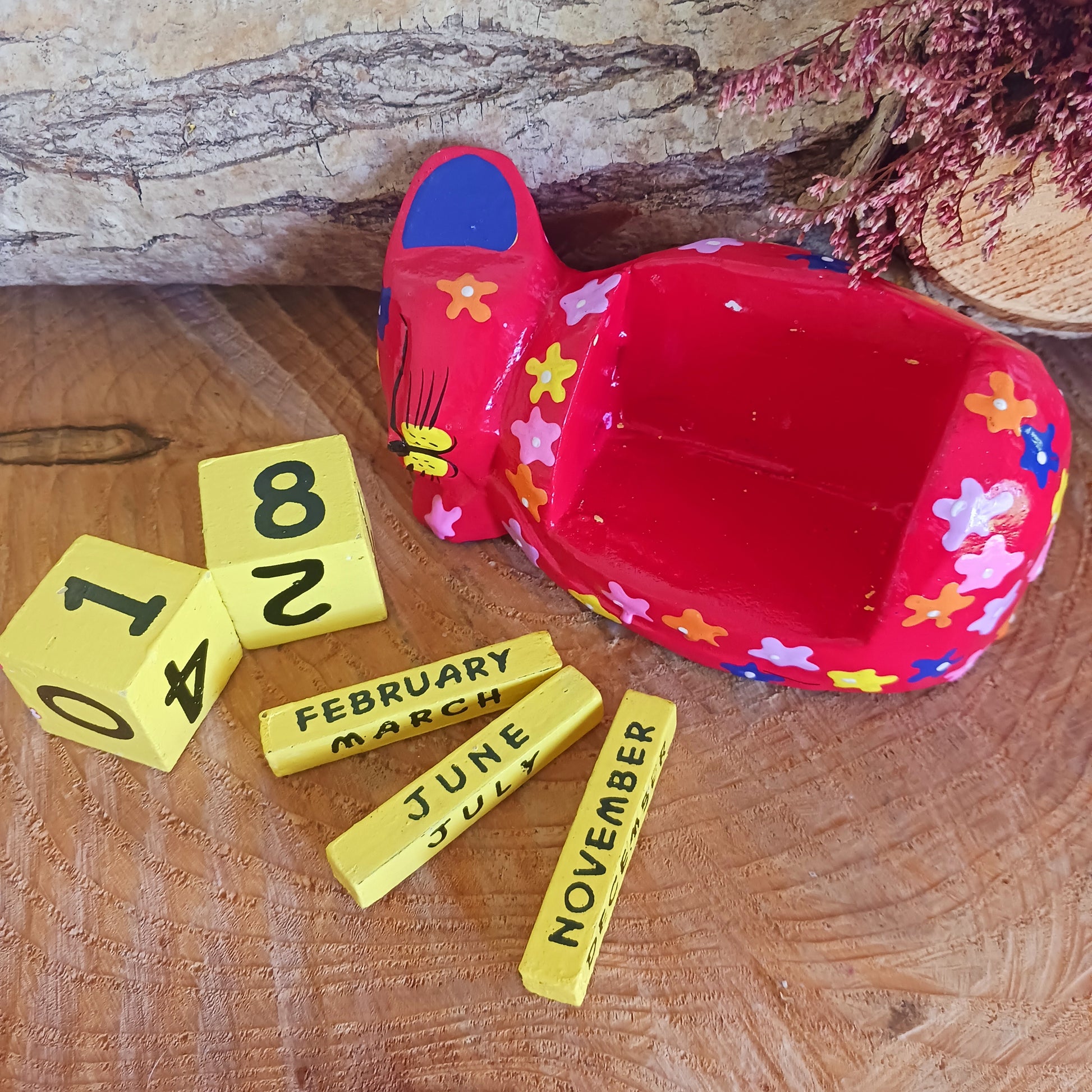 This fun, hand painted wooden calendar is perfect for your work or study space and makes a great desk-buddy too! Simply rotate the wooden blocks each day and use year after year.