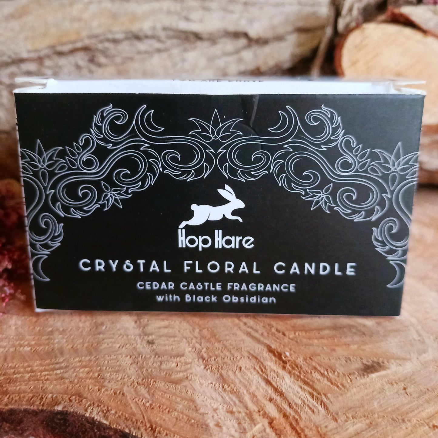 Step into the mystical world with Hop Hare Crystal Magic Flower Candle - The Knight of Swords, crafted with Black Obsidian Gemstones and dry flowers.