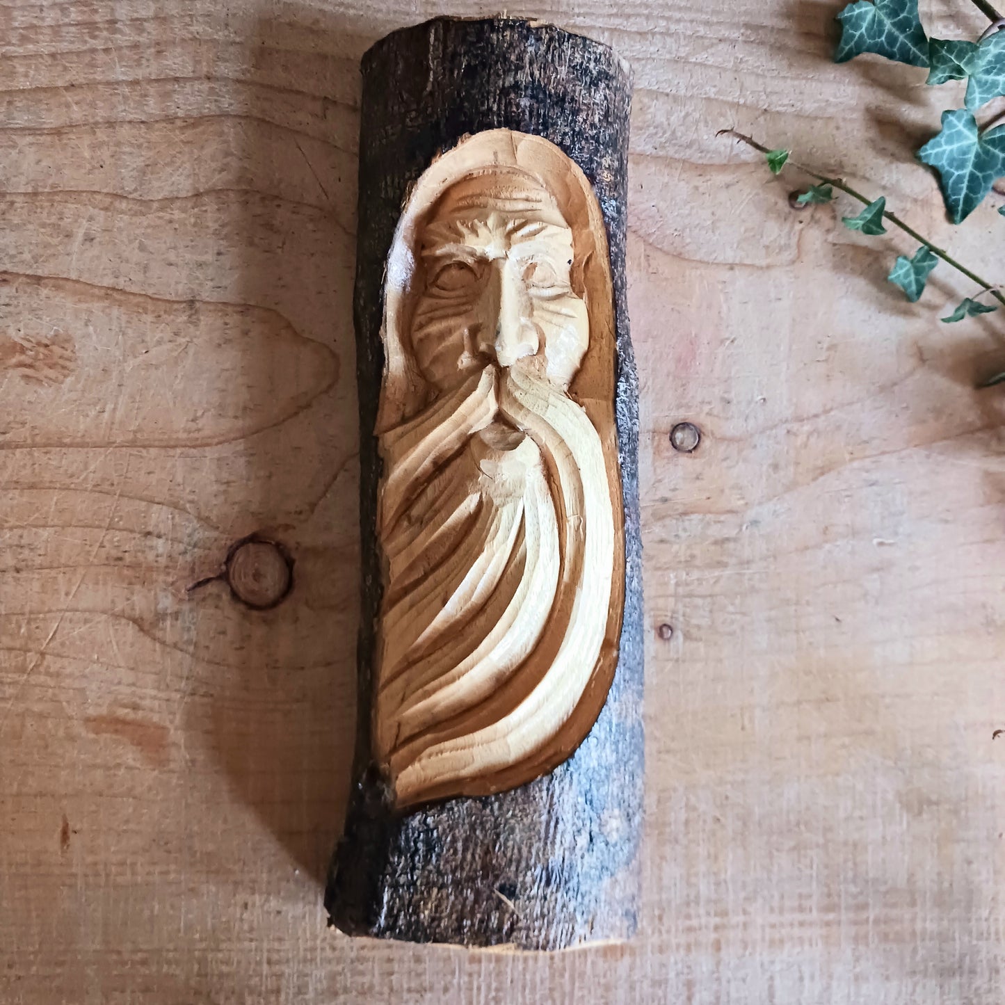 This wonderfully unique and beautifully designed tree stump log carving features the Tree Spirit 'Man of the Wood' face and is fashioned from the trunks of Chinaberry (Jempinis) and Hibiscus trunks off cuts.