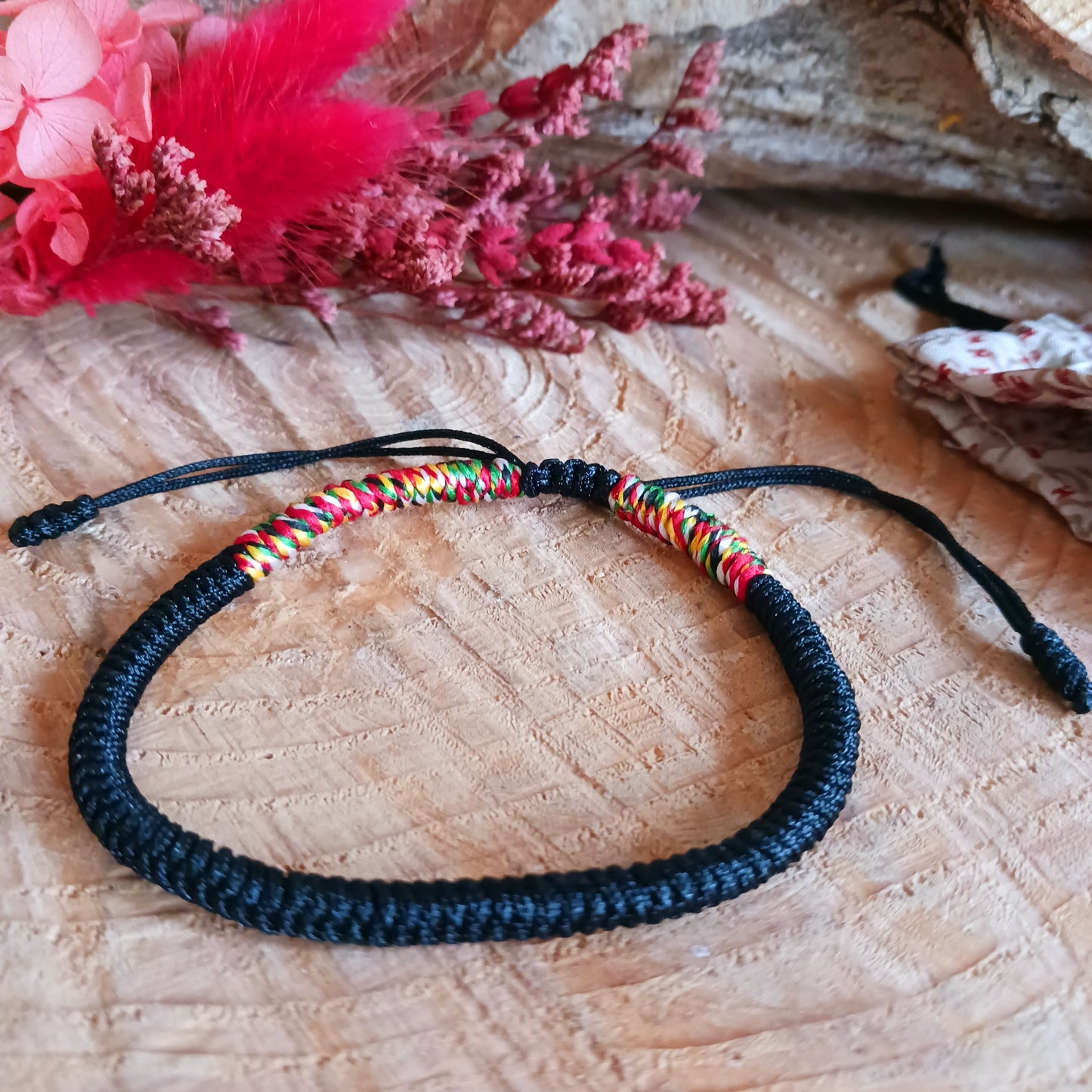 This Tibetan handmade knot rope bracelet is made with good quality braided cord, durable and last long time, super light, safe and comfortable to wear. One size but adjustable size make it suit anyone to wear.