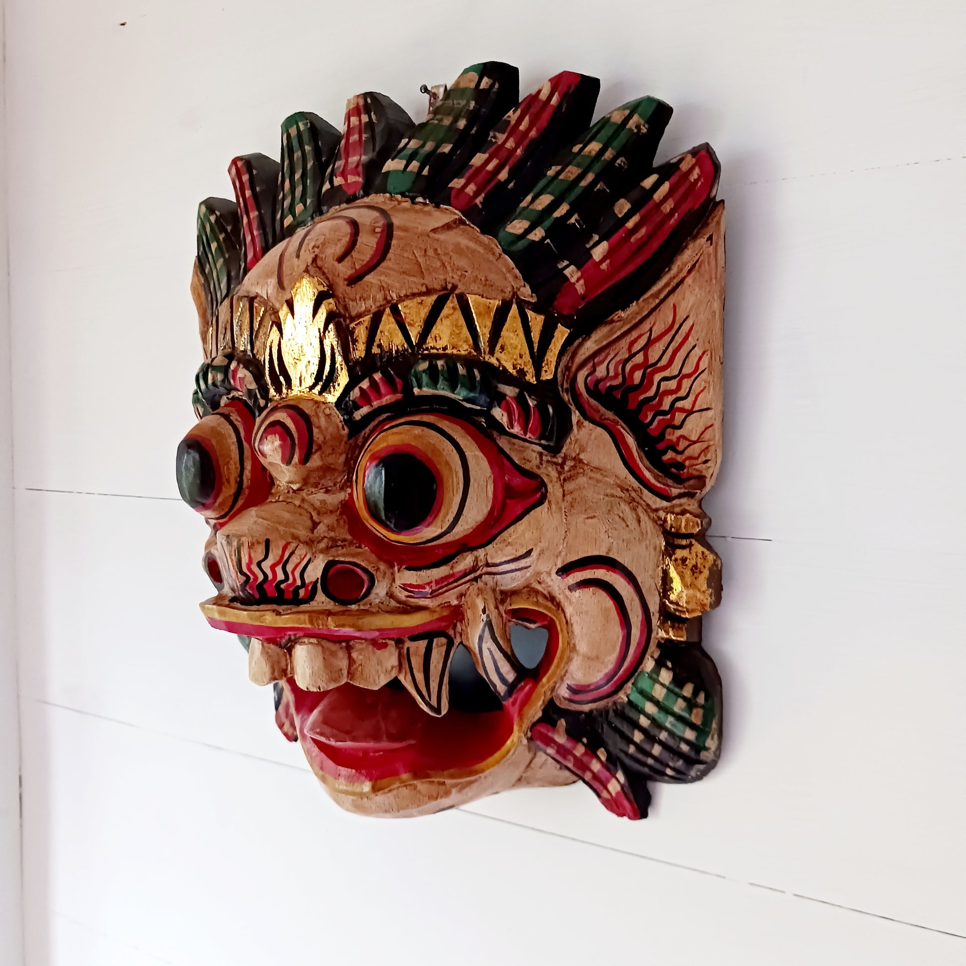 These intriguing masks have been hand carved by traditional artisans in Bali, Indonesia. The Raksassa mask is used in the traditional dance styles of Bali and can be literally translated as meaning "huge and strong" or simply "monster."