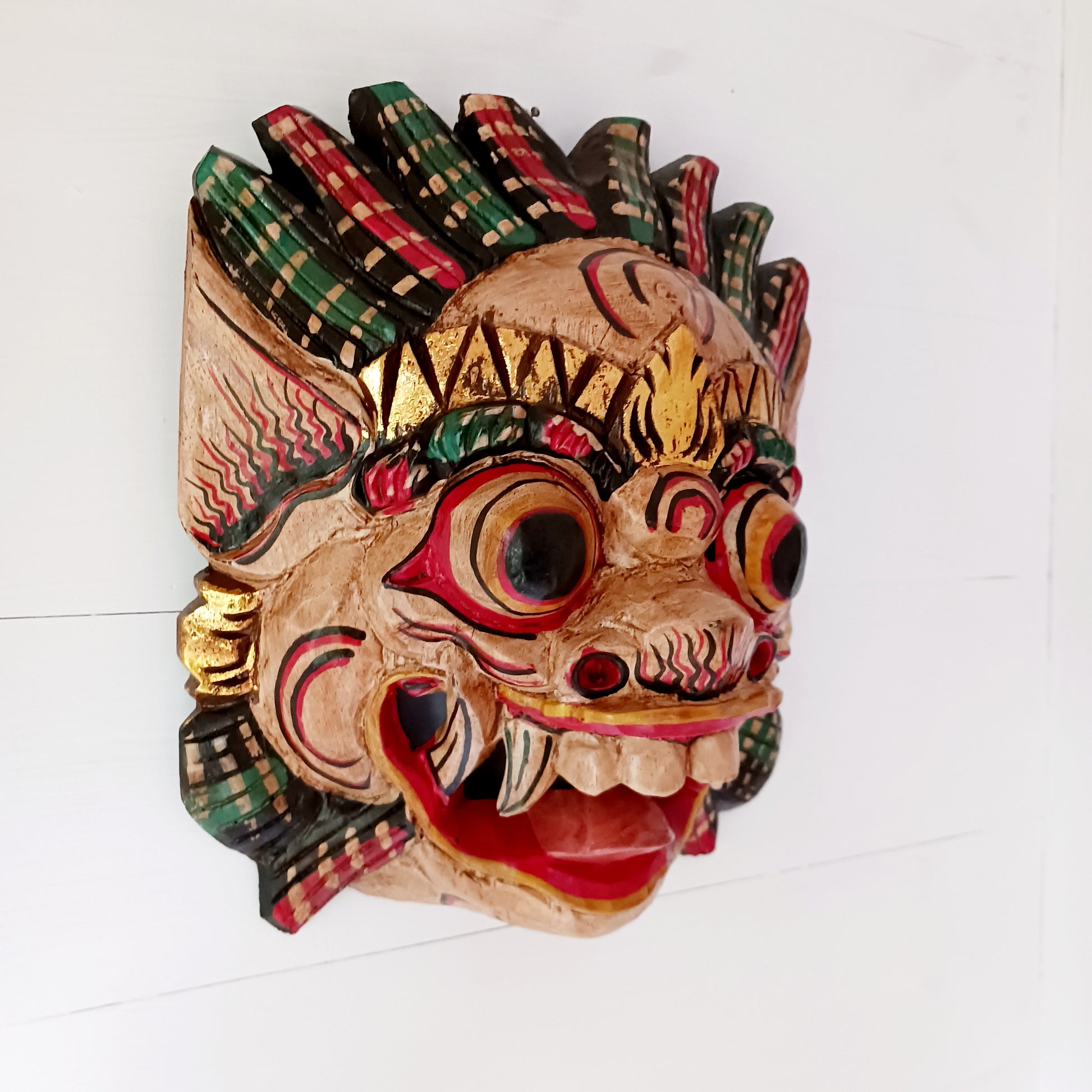 These intriguing masks have been hand carved by traditional artisans in Bali, Indonesia. The Raksassa mask is used in the traditional dance styles of Bali and can be literally translated as meaning "huge and strong" or simply "monster."