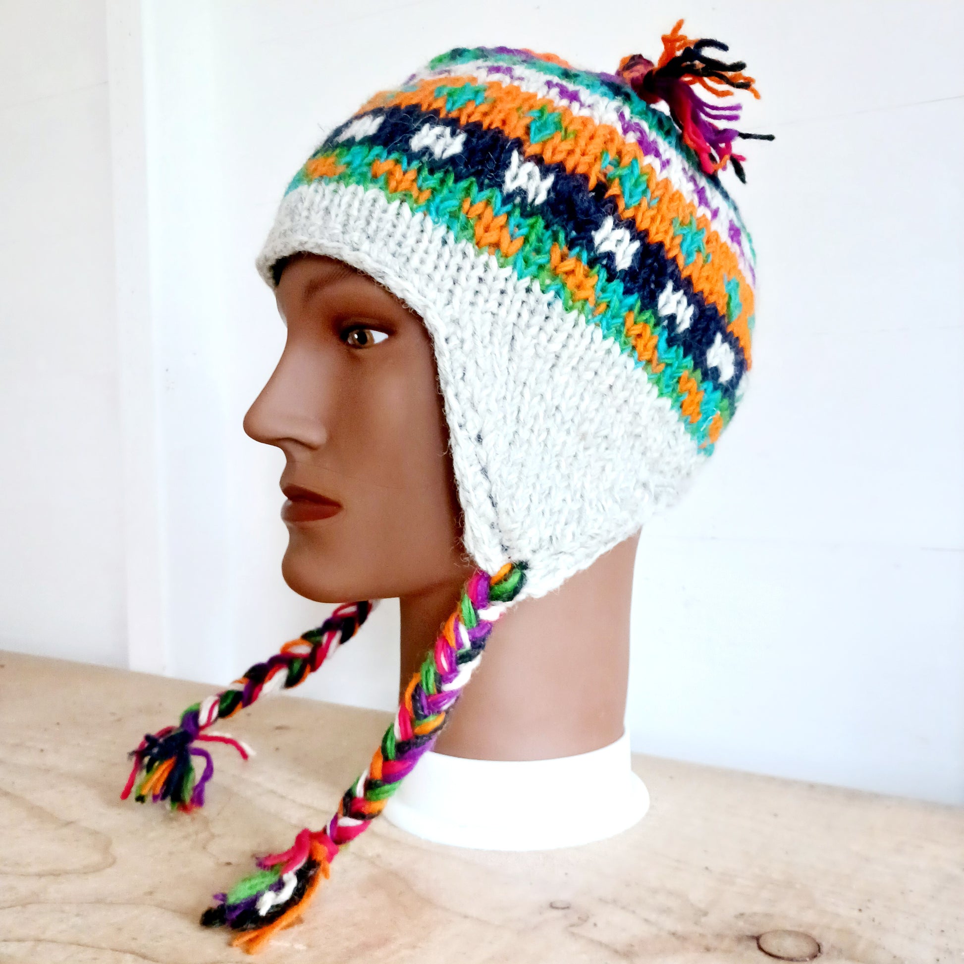 Chunky wool earflap hats hand made in Nepal with fleece lining for extra warmth and comfort, this handmade hat is awesomely warm.