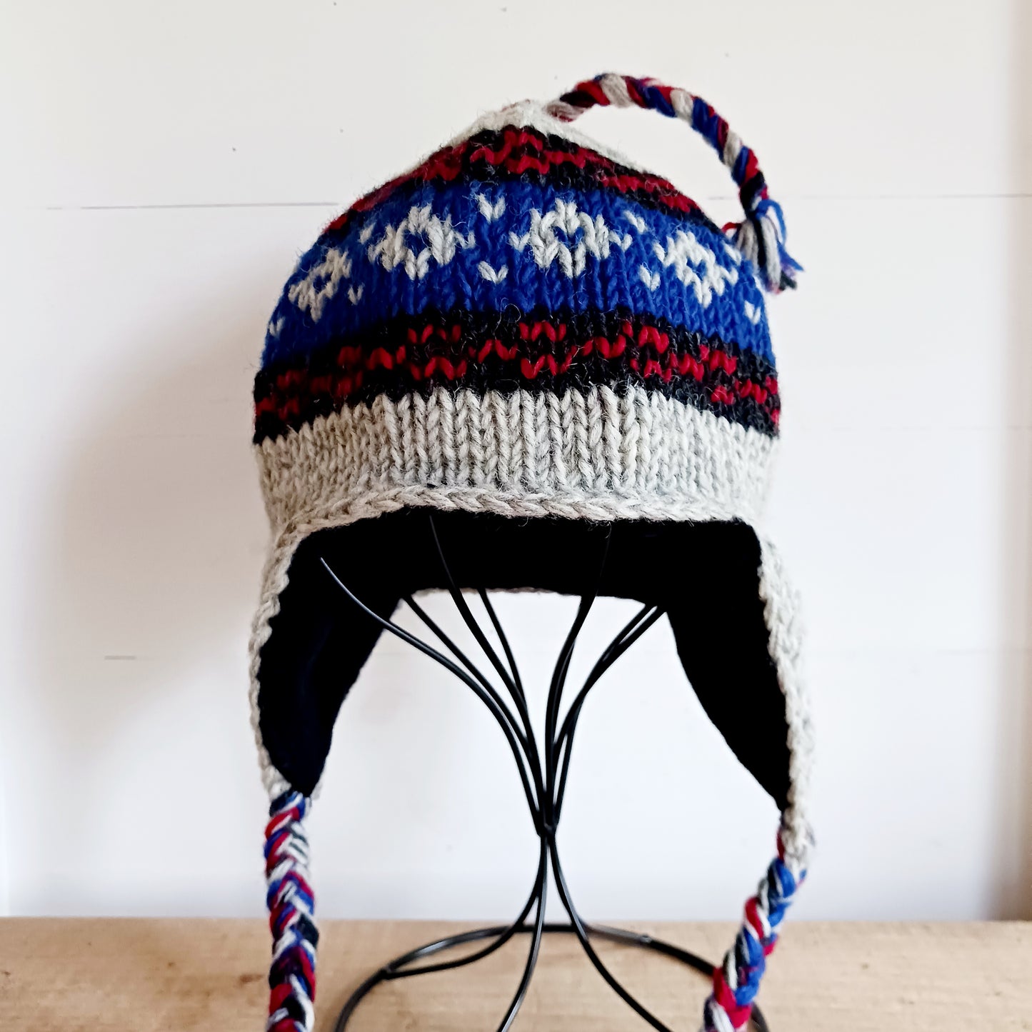 Chunky wool earflap hats hand made in Nepal with fleece lining for extra warmth and comfort, this handmade hat is awesomely warm.