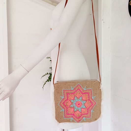 These unique and lovely bags have mandala patterns on smooth jute that has been washed with fashionable prints that are either printed or sewn onto it, and finished with a fringe. Handmade by a Balinese family business, these bags are carefully sewn by hand with intricate details.