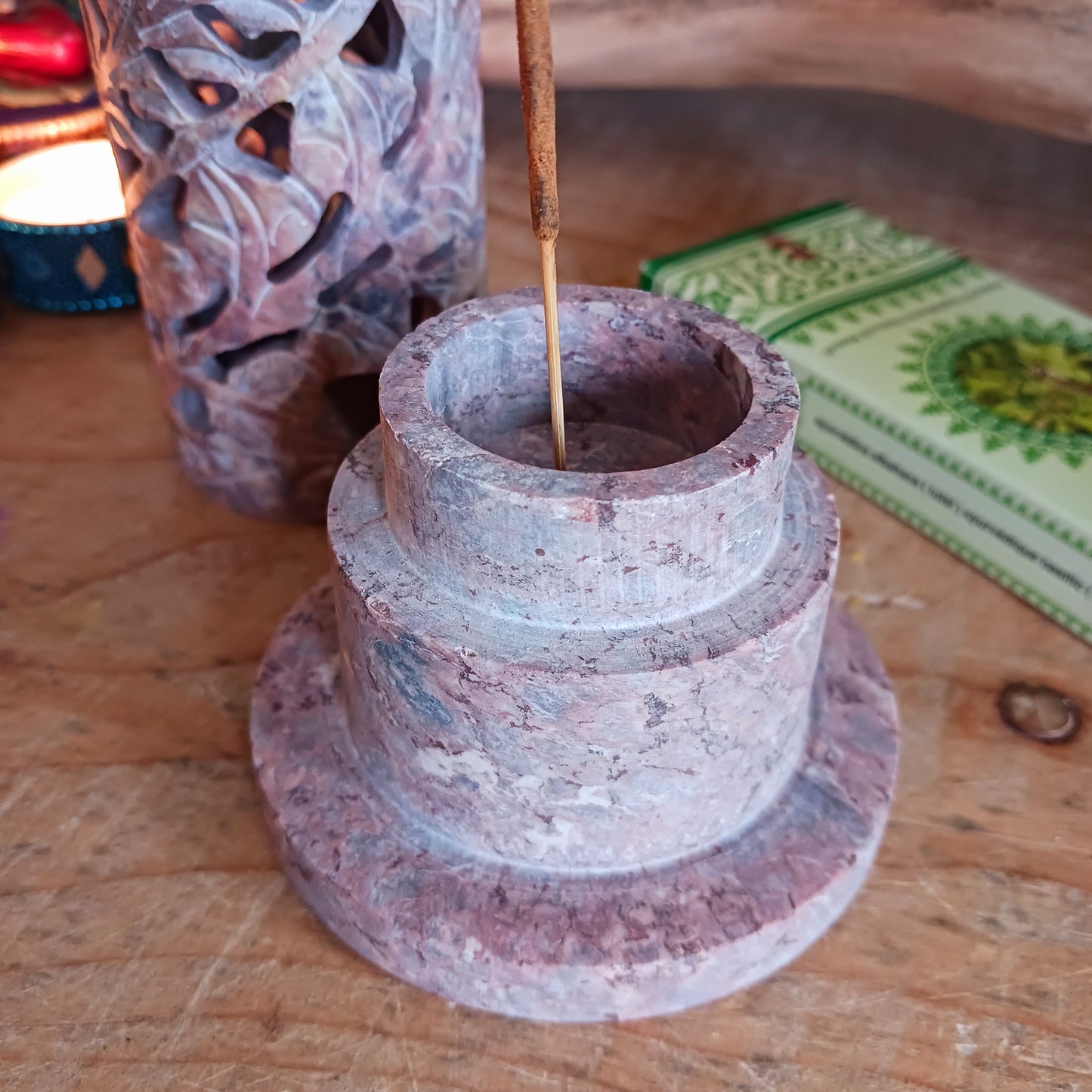 This hand carved soapstone incense tower is made in Agra, in a part of India famous for handcrafted stoneware as illustrated centuries ago by the intricate stonework on the Taj Mahal. The craft techniques for making this beautiful soapstone product has been passed down from generations.