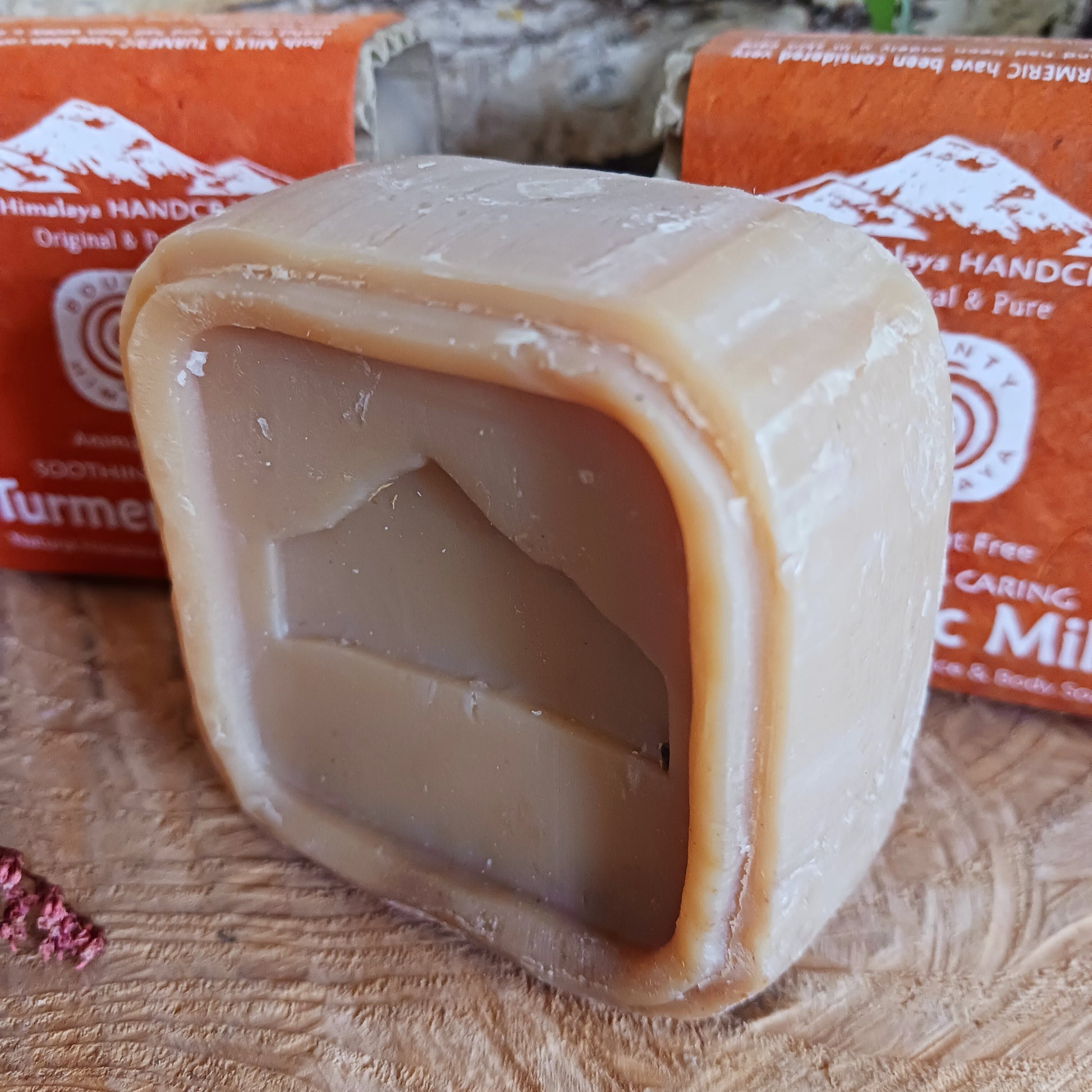 Handmade natural soap made in true artisan style by just a few workers in a tiny workshop in the foothills of the Himalayas. Each bar is wrapped in natural Lokta paper. This natural Tumerick Milk soap can be used on face and body and is soothing and moisturizing.