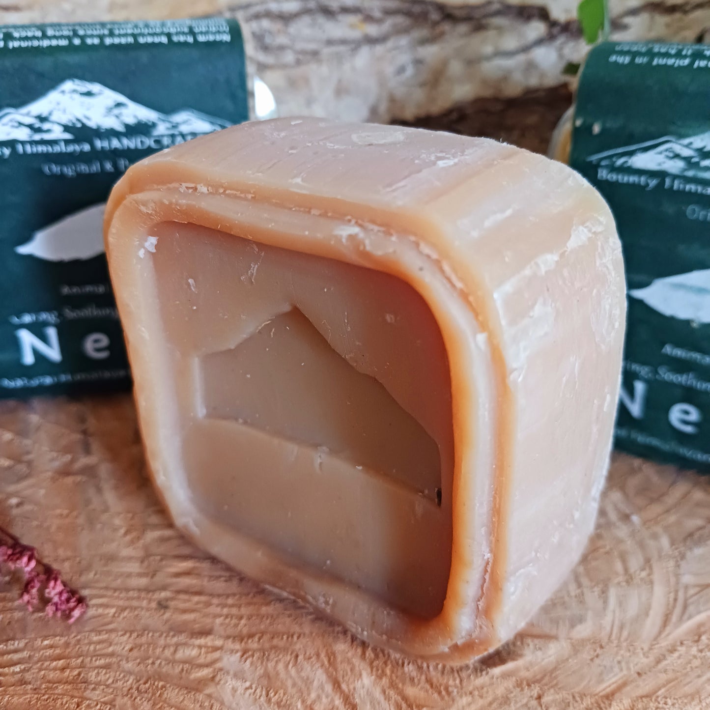 Handmade natural soap made in true artisan style by just a few workers in a tiny workshop in the foothills of the Himalayas. Each bar is wrapped in natural Lokta paper. This natural Neem soap can be used on face and body and is soothing and moisturizing.