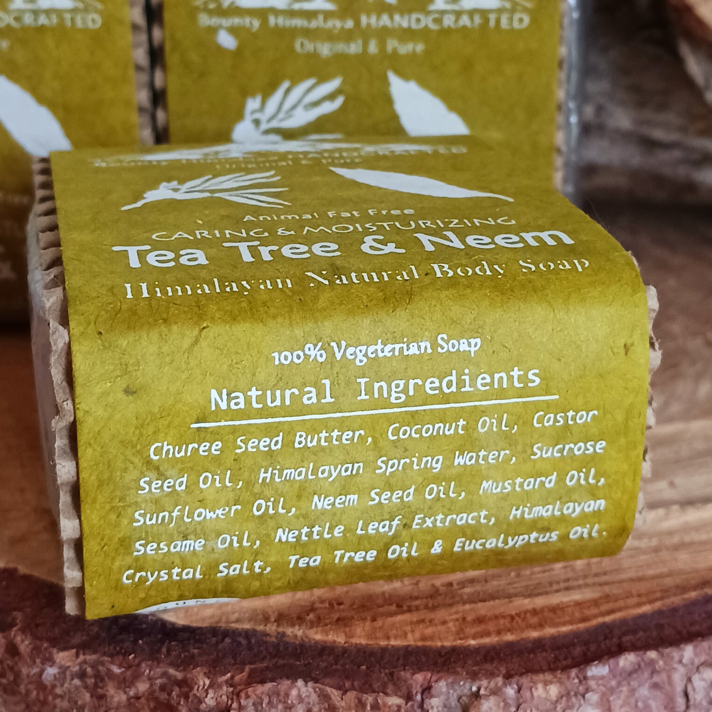 Handmade natural soap made in true artisan style by just a few workers in a tiny workshop in the foothills of the Himalayas. Each bar is wrapped in natural Lokta paper. This natural Tea Tree and Neem soap can be used on face and body and is soothing and moisturizing.