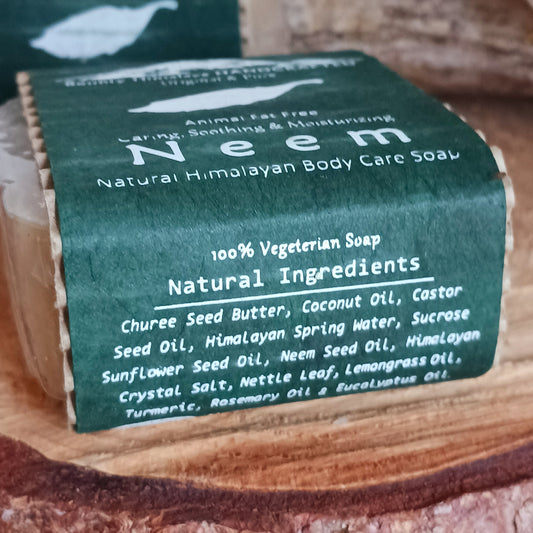 Handmade natural soap made in true artisan style by just a few workers in a tiny workshop in the foothills of the Himalayas. Each bar is wrapped in natural Lokta paper. This natural Neem soap can be used on face and body and is soothing and moisturizing.
