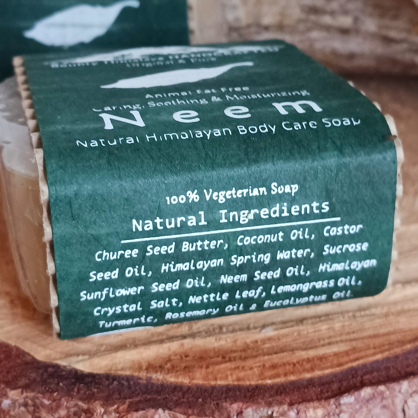 Handmade natural soap made in true artisan style by just a few workers in a tiny workshop in the foothills of the Himalayas. Each bar is wrapped in natural Lokta paper. This natural Neem soap can be used on face and body and is soothing and moisturizing.