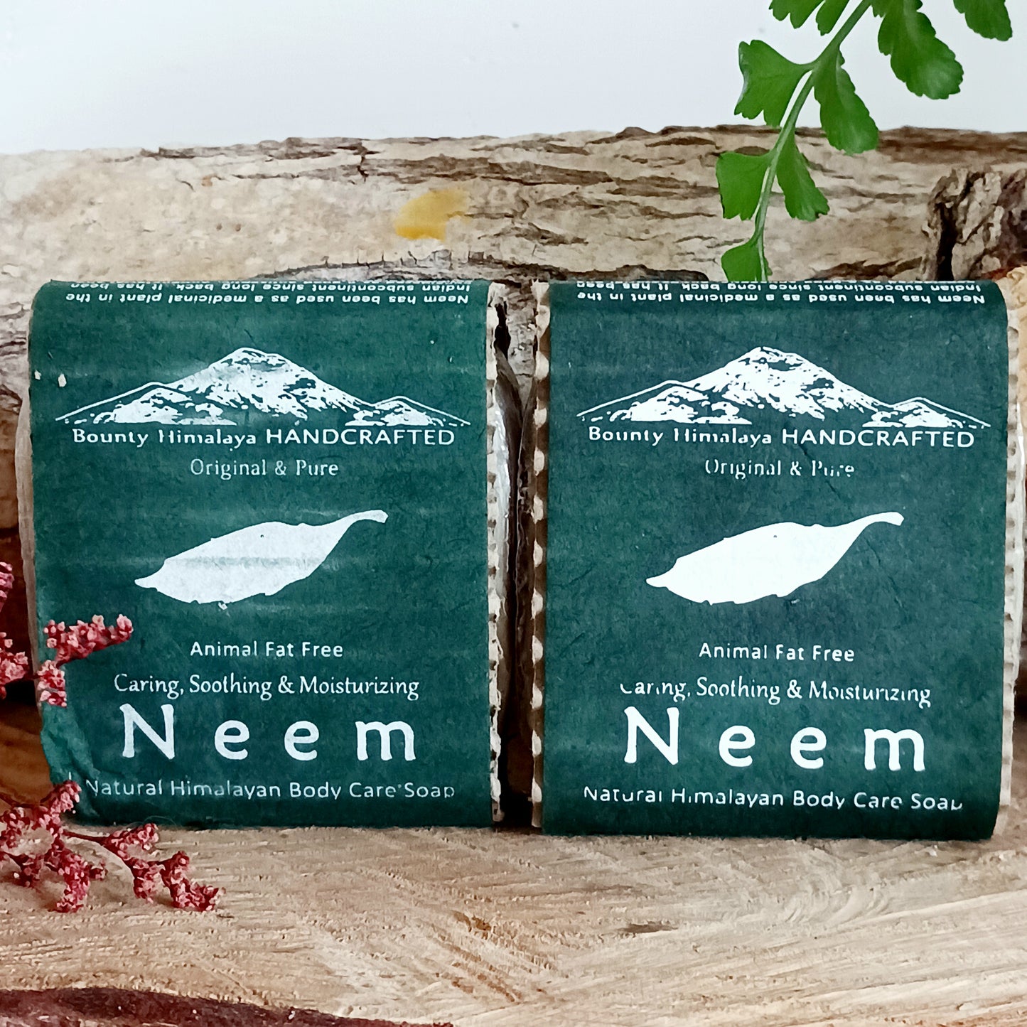 Handmade natural soap made in true artisan style by just a few workers in a tiny workshop in the foothills of the Himalayas. Each bar is wrapped in natural Lokta paper. This natural Neem soap can be used on face and body and is soothing and moisturizing.