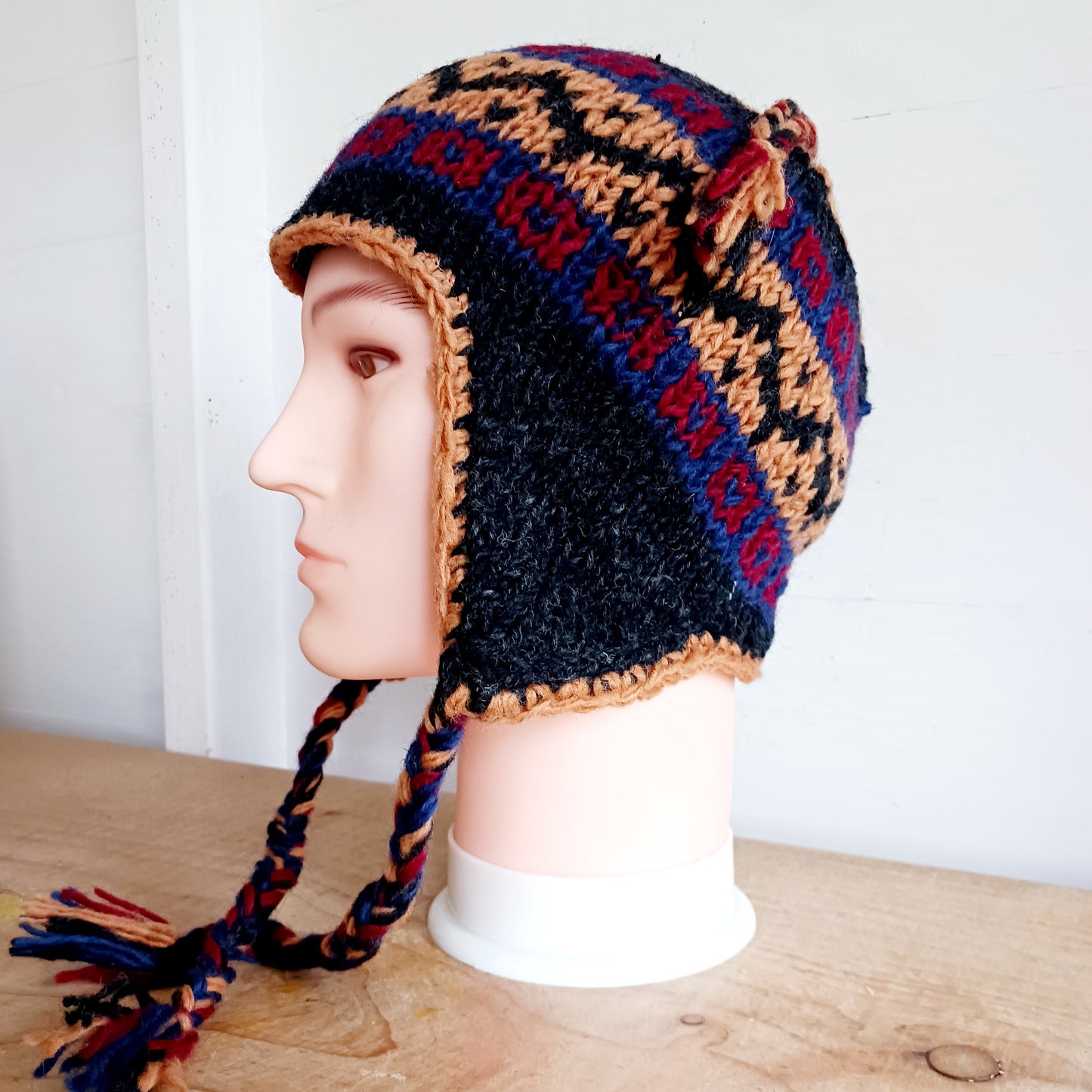 Chunky wool earflap hats hand made in Nepal with fleece lining for extra warmth and comfort, this handmade hat is awesomely warm.