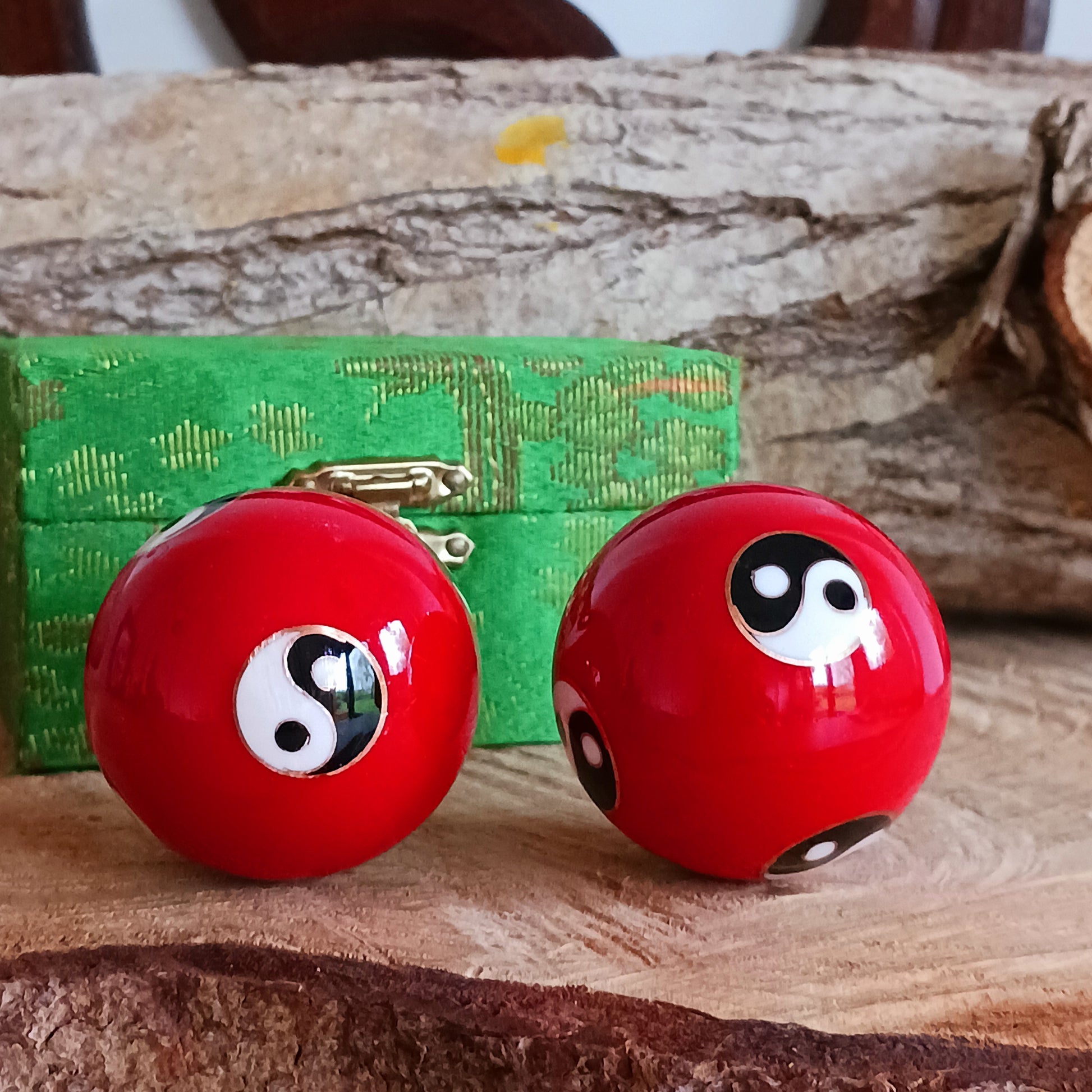 There is a sound mechanism inside the health balls causing a tender sound. Each health ball has a diameter of about 4 cms. They come in a set of two, in a padded brocade box of beautiful Chinese silk embroidery.