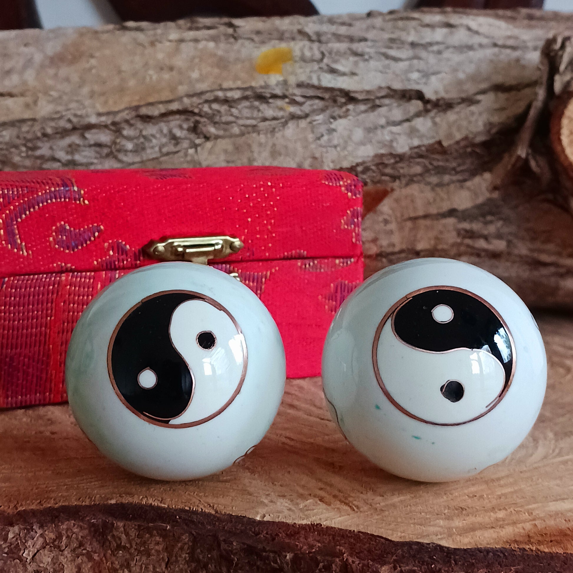 There is a sound mechanism inside the health balls causing a tender sound. Each health ball has a diameter of about 4 cms. They come in a set of two, in a padded brocade box of beautiful Chinese silk embroidery.