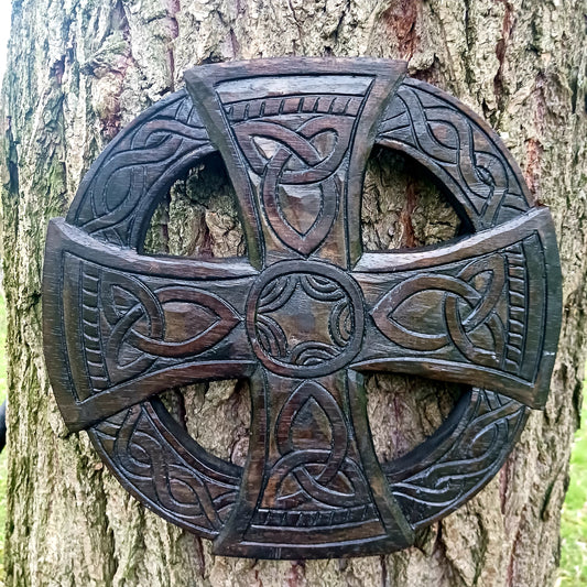 This lovely round variation of a Celtic cross is often known as a Sun cross and its origins go back as far into the past as the Neolithic period.