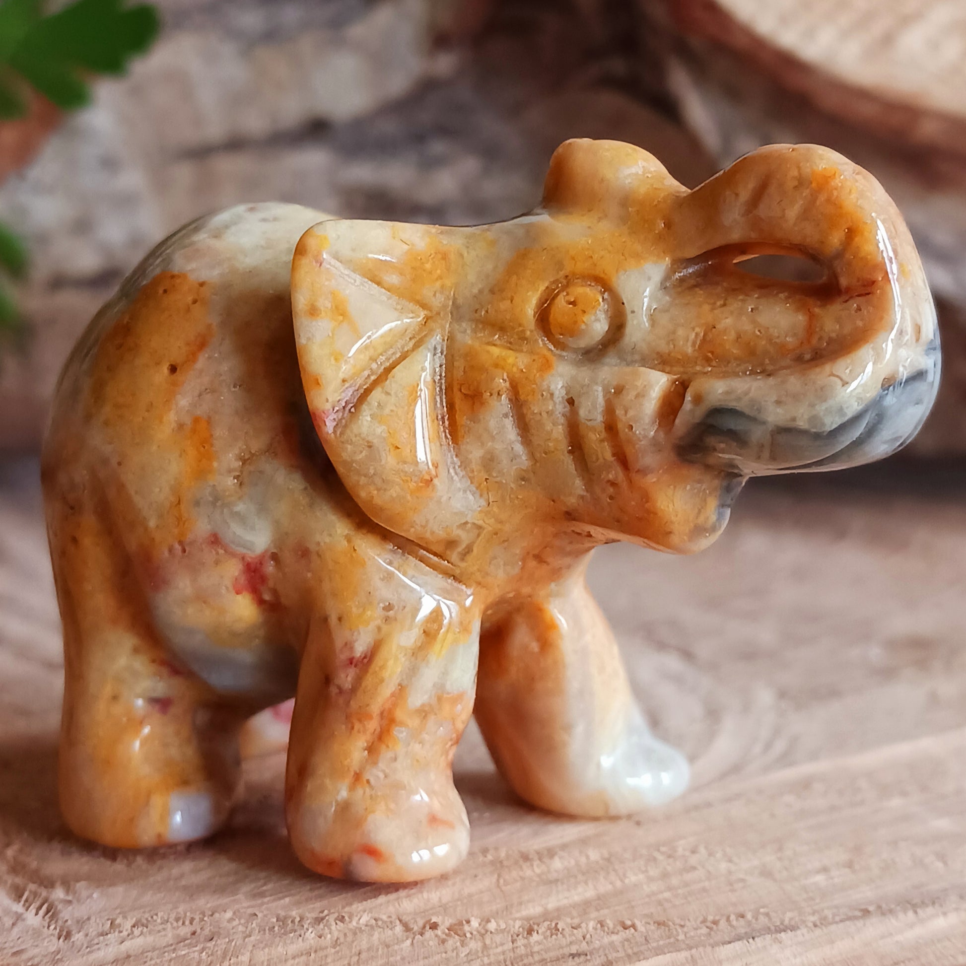 This lovely Gemstone Lucky Elephant has been meticulously handcarved from Crazy Lace Agate. Elephants symbolise wisdom, protection, and good fortune, and this charming figure seamlessly blends artistry with the Agate stone's natural, captivating beauty.