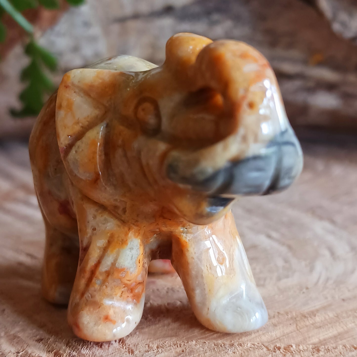 This lovely Gemstone Lucky Elephant has been meticulously handcarved from Crazy Lace Agate. Elephants symbolise wisdom, protection, and good fortune, and this charming figure seamlessly blends artistry with the Agate stone's natural, captivating beauty.