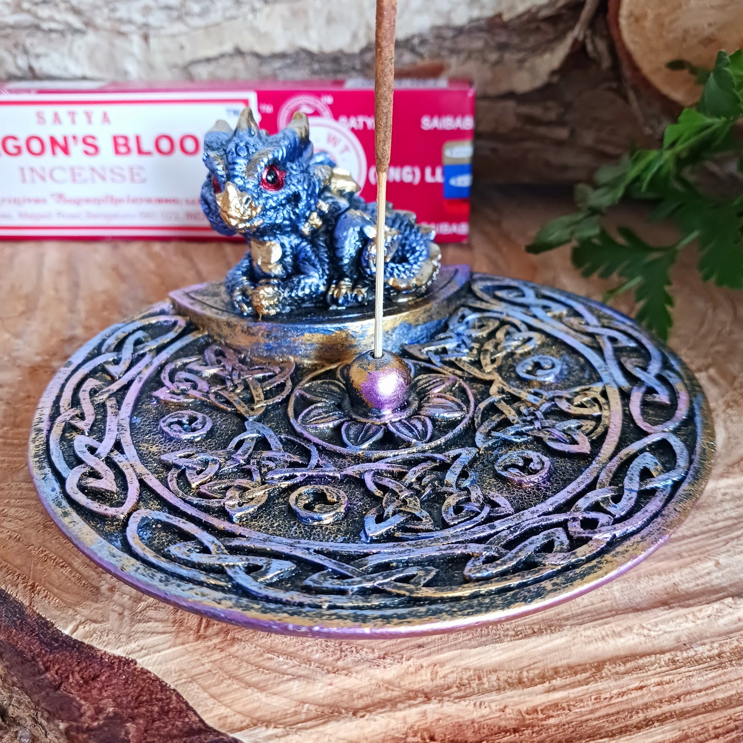 Embrace mystical vibes with this enchanting Celtic dish incense holder featuring a whimsical baby dragon. Crafted with intricate detail, the baby dragon perches atop the dish, its scaled wings unfurled in a protective stance. The Celtic design adds an aura of ancient magic, perfect for any altar or sacred space.