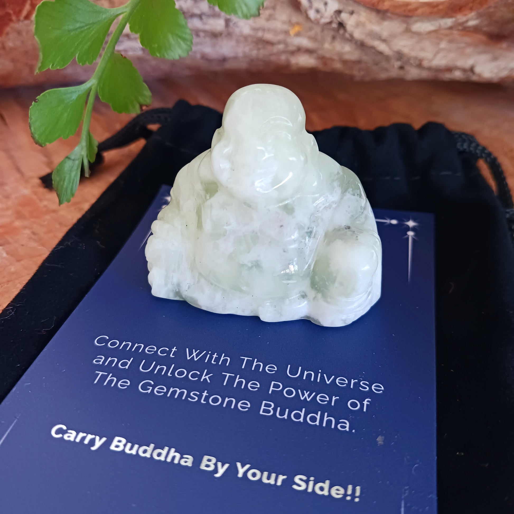 This beautiful miniature handcarved Laughing Buddha has been crafted from genuine Jade Gemstone. This gemstone Buddha is a jolly and elegant symbol of peace, spiritual growth, and inner clarity.