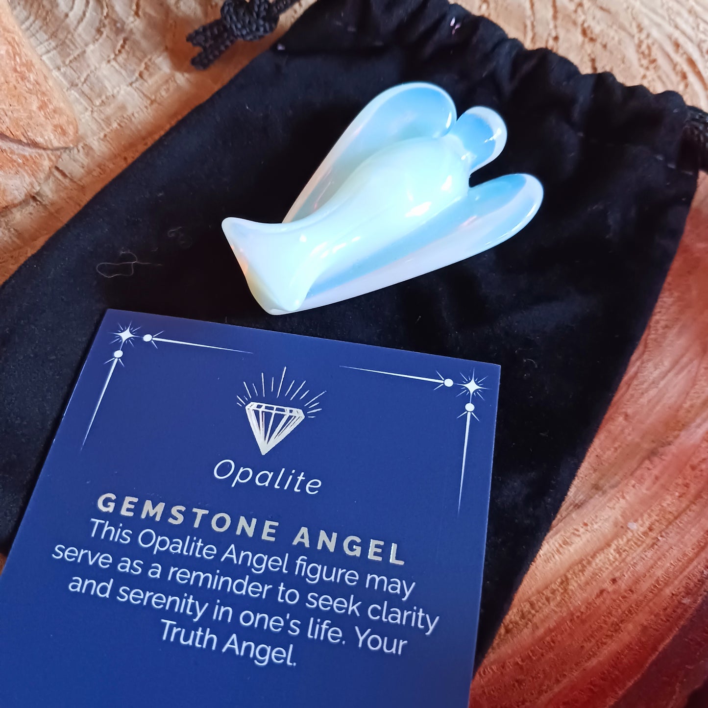 These beautiful angels are hand carved from Opalite. Opalite is treasured for its array of metaphysical properties, including its calming influence, capacity to enhance communication, role in spiritual growth, and potential to boost intuition.